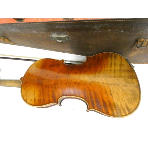 38 - Vintage half size violin and bow in leather case.