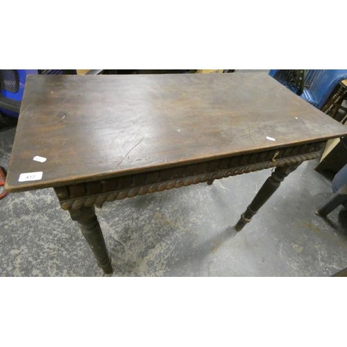 477 - Regency style mahogany table with turned legs.