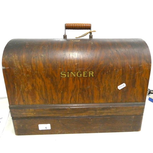 6 - Oak cased Singer sewing machine.