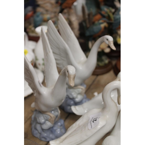 230 - Nao porcelain Swan and Geese figurines.