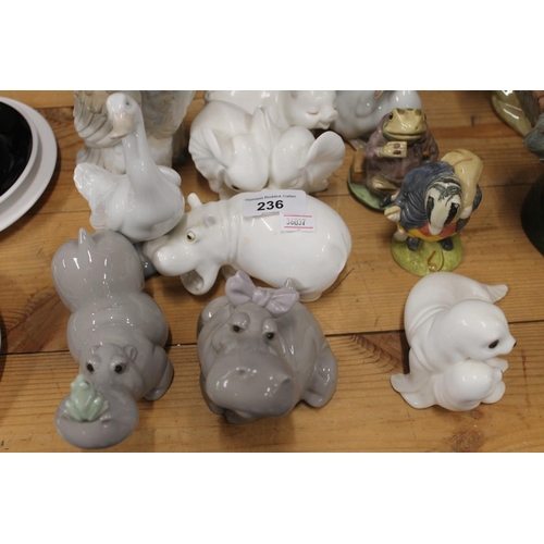 236 - Nao Hippos, two Royal Albert Beatrix Potter figures, Nao owl, Wade Sandeman decanters etc.