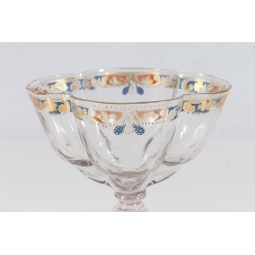 248 - Late 19thC Bohemian quatrefoil shape wine glass with Moser style enamel decoration to rim, H11.5cm.