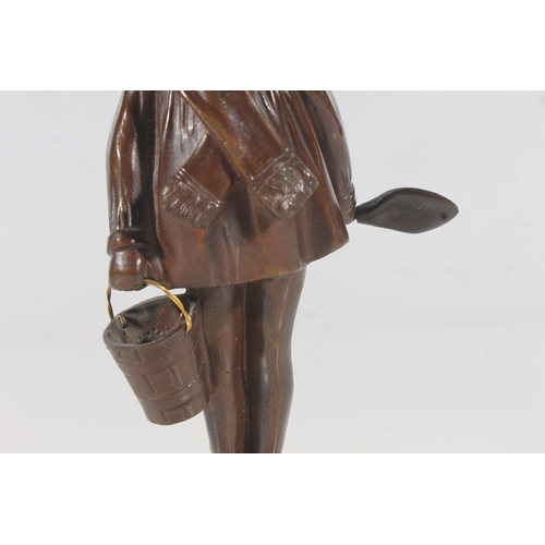 251 - Modern Art Deco style figurine of a girl with bucket and spade, H16cm.