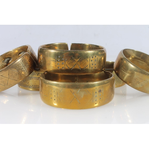 254 - Group of African heavy bronze cuff bangles.