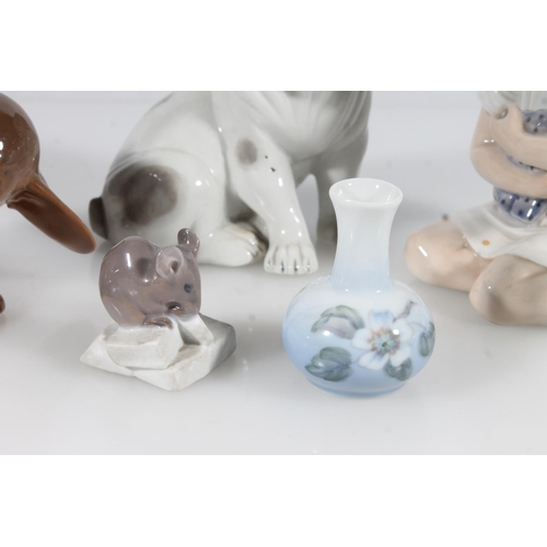 263 - Three Royal Copenhagen porcelain figurines, small Copenhagen vase and a continental porcelain figuri... 