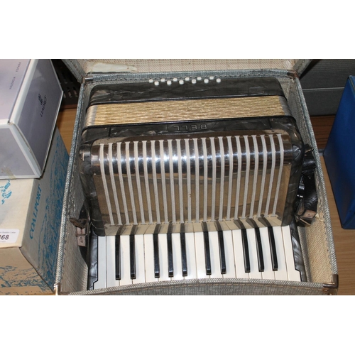 370 - Cased Bell accordion.