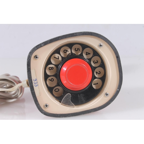 38 - Ericsson LM Cobra telephone in red colourway with numbered dial to base.