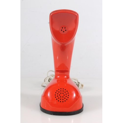 38 - Ericsson LM Cobra telephone in red colourway with numbered dial to base.