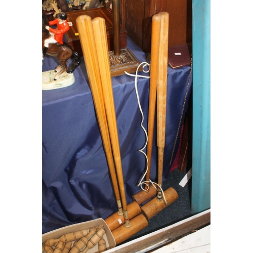 400 - Croquet sets to include skittles, forks and a vintage suitcase.