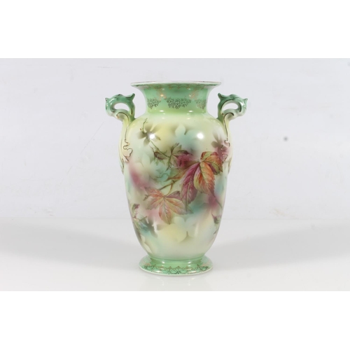 42 - Early 20thC German porcelain vase with transfer printed design of parrots on a green ground, H19.5cm... 