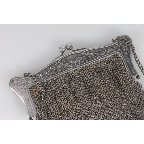 82 - Early 20thC continental mesh chain purse, the interior marked 'German silver'.