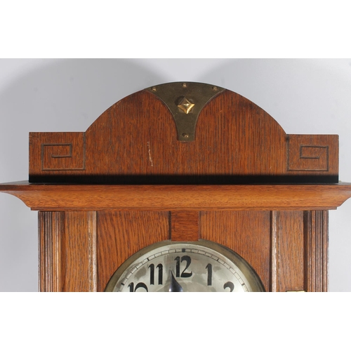 89 - Early 20thC oak cased wall clock.