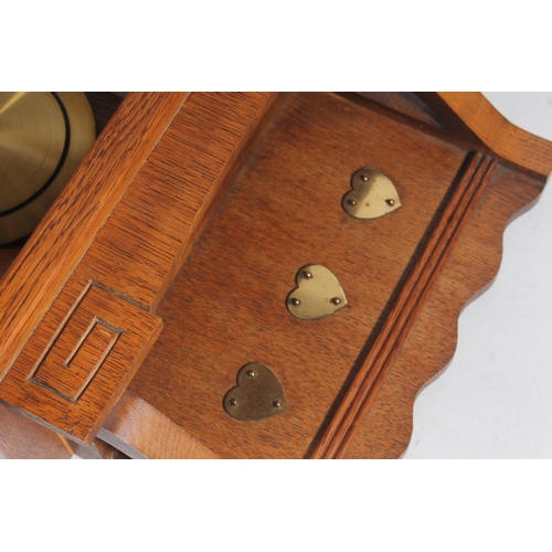 89 - Early 20thC oak cased wall clock.