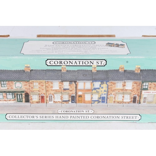 93 - Coronation Street collectors model street with houses by Henderson models in original boxes.