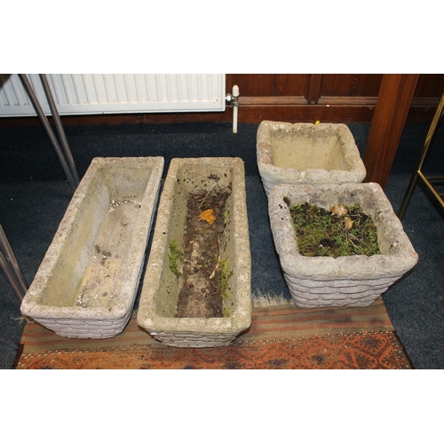 30B - A pair of rectangular composite stoneware planters together with a matching pair of similar square f... 