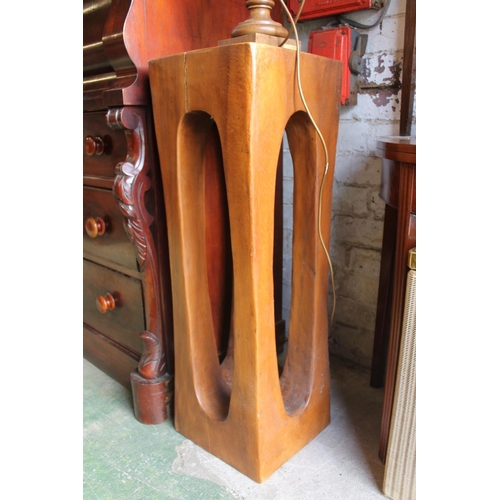 560 - Modernist free form sculptural plant stand with an oak table lamp (2).