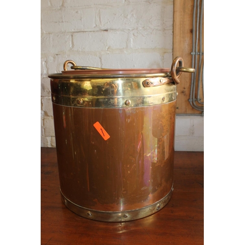 562 - Copper and brass coal bucket.