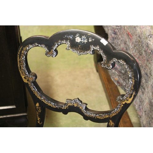 596 - Two similar ebonised Victorian chairs with gilt and mother of pearl decoration.