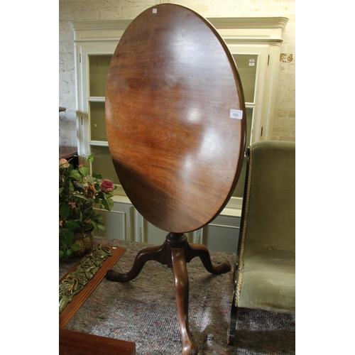 600 - Mahogany tilt top occasional table.