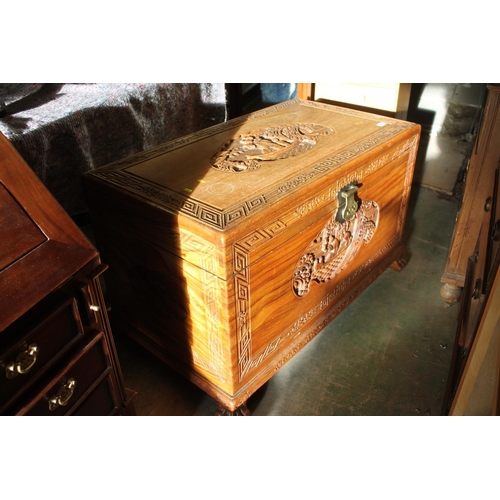 602 - Oriental light hardwood carved chest.