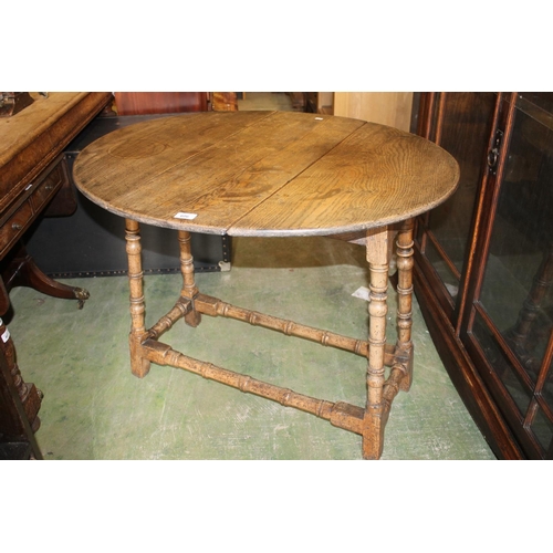 606 - Country style farmhouse drop leaf table.