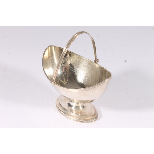 10 - Geo.III silver sugar basket, of oval navette shape with reeded border and foot under overswing handl... 