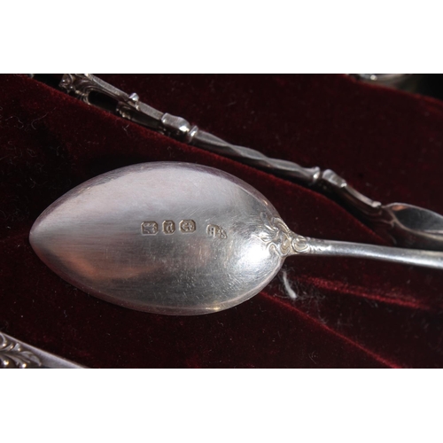 12 - Set of six Victorian silver teaspoons with matching sugar tongs, decorated in pierced foliate scroll... 