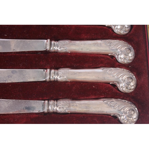 13 - Cased set of six hallmarked silver handled pistol grip butter knives, cased set of silver teaspoons ... 