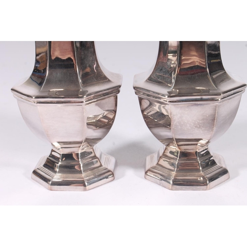 24 - Cased pair of ER.II silver sugar castors, of typical form,  London 1969, A. Chick & Sons, gross ... 