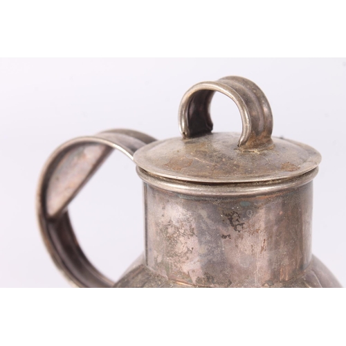 37 - A pair of ER.II Guernsey silver lidded milk jugs together with a small lidded cream jug, hallmarked ... 