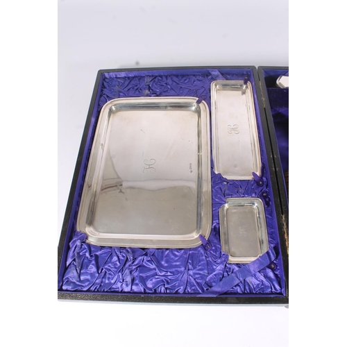 48 - Geo.V silver dressing table vanity set, consisting of tray, soap dish, rectangular pin dish, four br... 