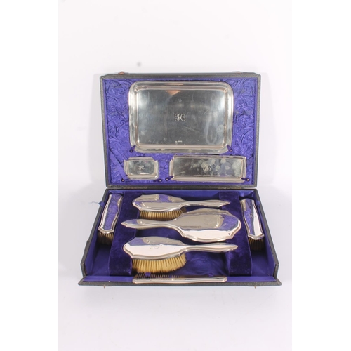 48 - Geo.V silver dressing table vanity set, consisting of tray, soap dish, rectangular pin dish, four br... 