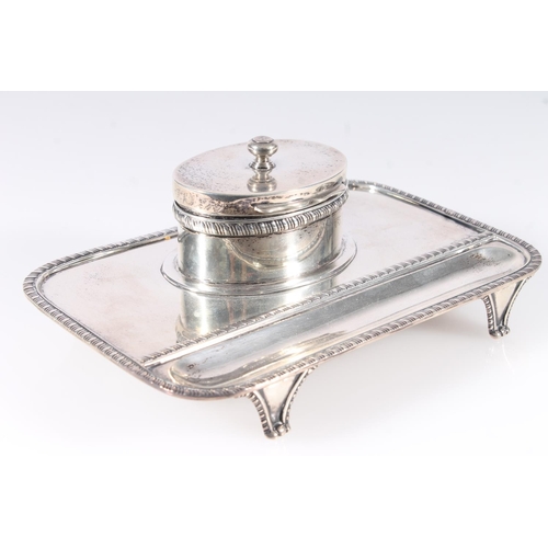 51 - Geo.V silver inkstand, the rectangular stand with canted corners and gadrooned rims, recessed pen be... 