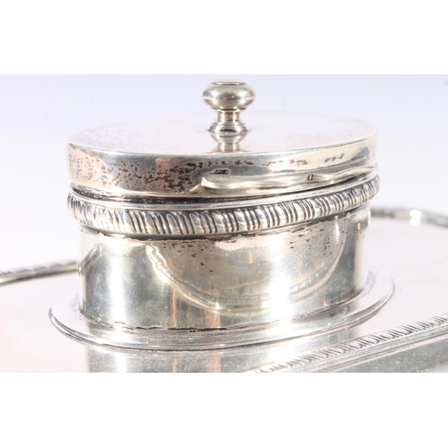 51 - Geo.V silver inkstand, the rectangular stand with canted corners and gadrooned rims, recessed pen be... 