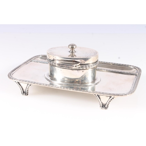 51 - Geo.V silver inkstand, the rectangular stand with canted corners and gadrooned rims, recessed pen be... 