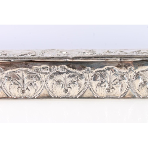 56 - Victorian silver table box, of rectangular shape, the hinged cover embossed with a procession of cla... 