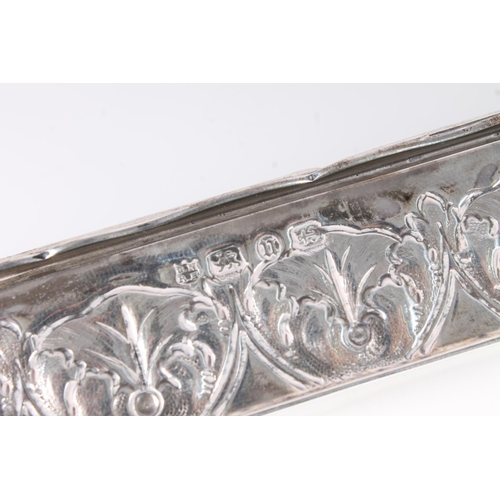 56 - Victorian silver table box, of rectangular shape, the hinged cover embossed with a procession of cla... 