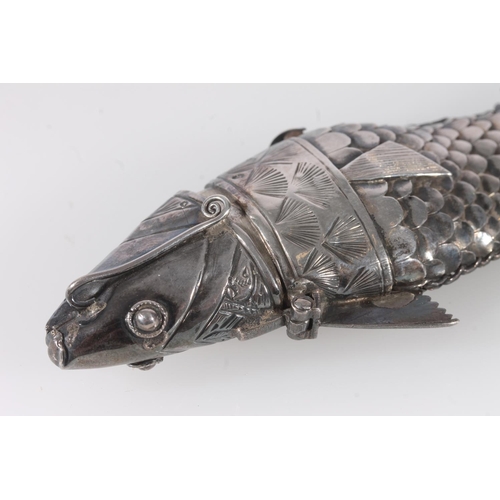 57 - Continental white metal model of a fish, the hinged head opening to reveal small compartment over ar... 