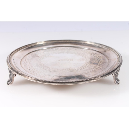 58 - Victorian silver salver, with beaded border on a round body, the centre with concentric designs and ... 