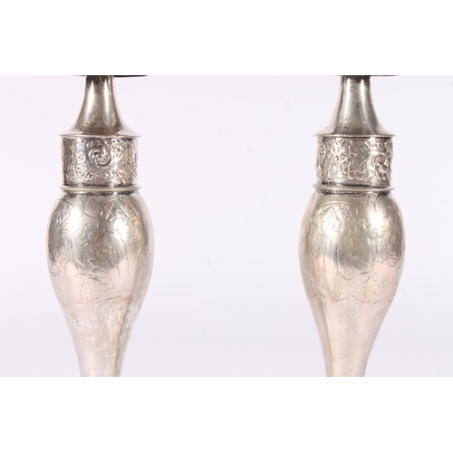 61 - Pair of weighted German Prussian silver candlesticks, early to mid 19th century, the round sconces a... 