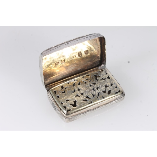 64 - Geo.III silver vinaigrette, of rectangular curved shape with engraved leaf decoration, opening to re... 