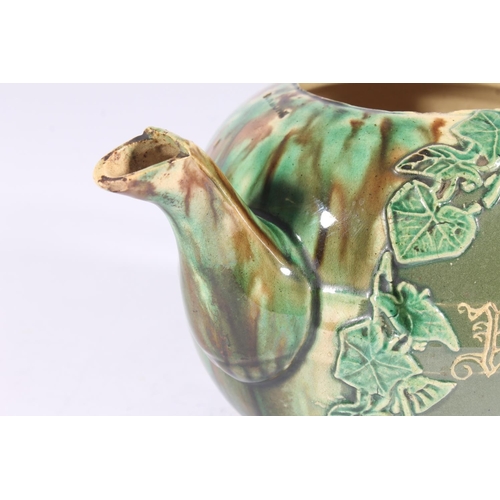 311 - Victorian Dunmore pottery Majolica teapot, of mottled green and brown glaze around an ivy framed car... 