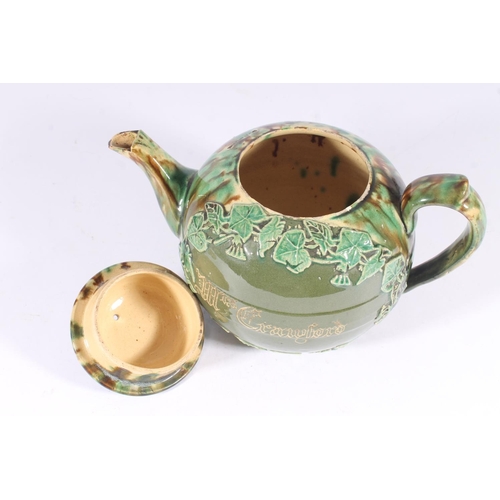 311 - Victorian Dunmore pottery Majolica teapot, of mottled green and brown glaze around an ivy framed car... 