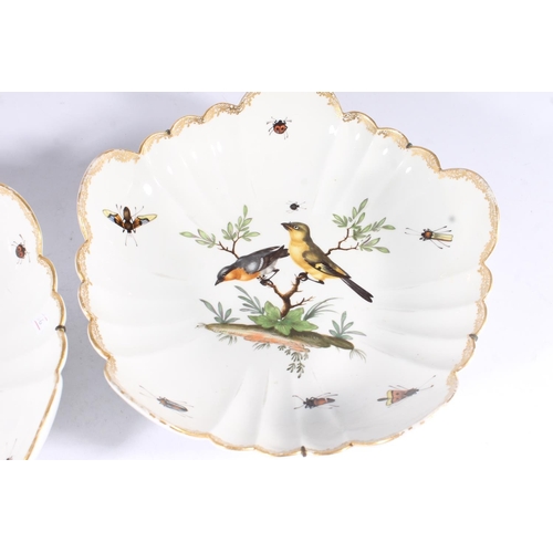 312 - Pair of Dresden porcelain bowls, late 19th century, with gilt lobed borders and painted with polychr... 