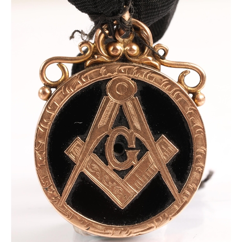 50 - 9ct gold masonic medallion with black enamel inlay 8.7 grms gross....