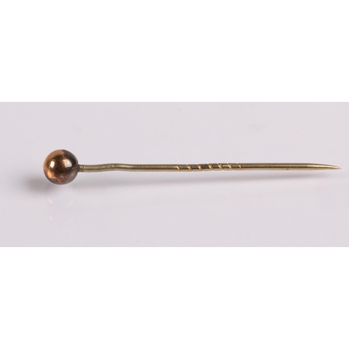 62 - Yellow metal stick pin with cylinderical knop.