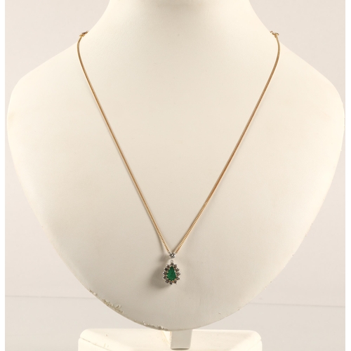 63 - 18ct gold necklace with emerald and diamond cluster pendant