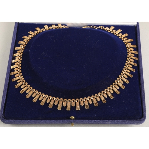 69 - 9ct gold fringe necklace in the 1970's Brutaliist style, 16g.