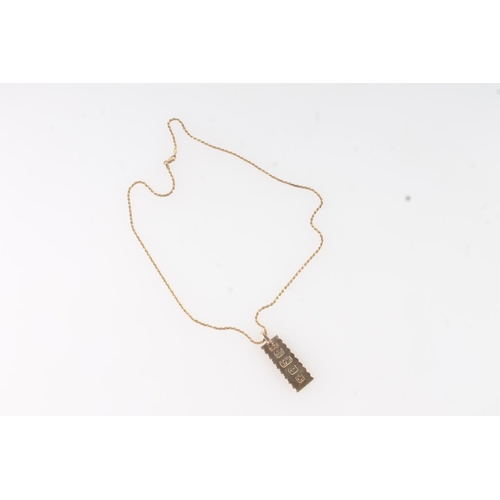 1723 - 9ct gold ingot pendant on 9ct gold rope twist chain, 20.7g gross.