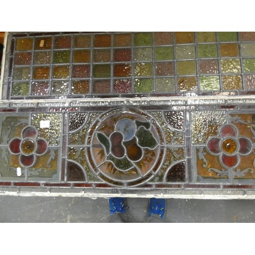 285 - Two large stained glass windows.